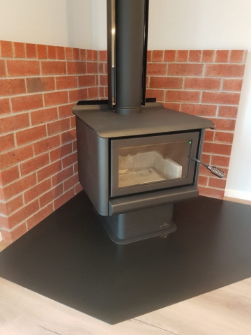 Driver Rd Fireplace Focal driver road new build project view of the indoor fireplace in the corner of the living room