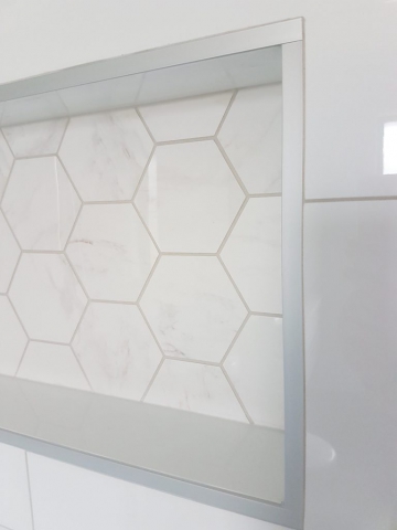 Driver Rd Bathroom feature tile Focal driver road new build project feature hexagon tile used in the recessed soap boxes