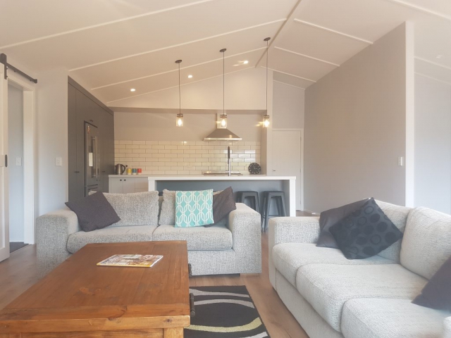 Driver Rd Living Room Focal of driver road new build project view of the living room and looking into the kitchen in the background