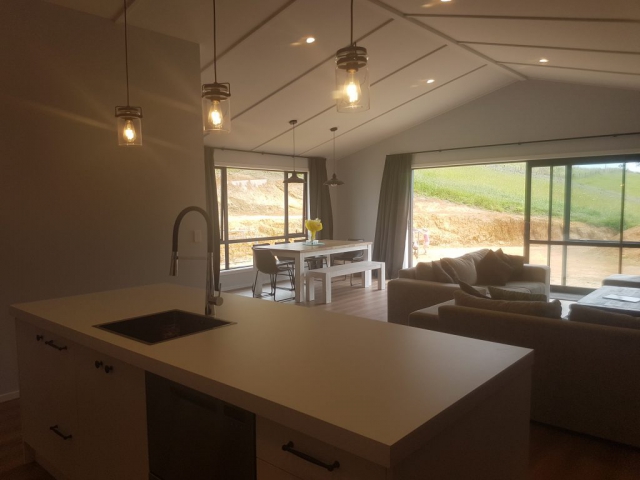 Driver Rd Kitchen Focal driver road new build project looking from the kitchen out into the living area